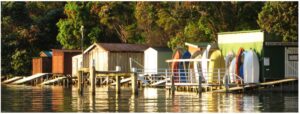 rocky-bay-boatsheds-1200x400-nz-canvas-order-in